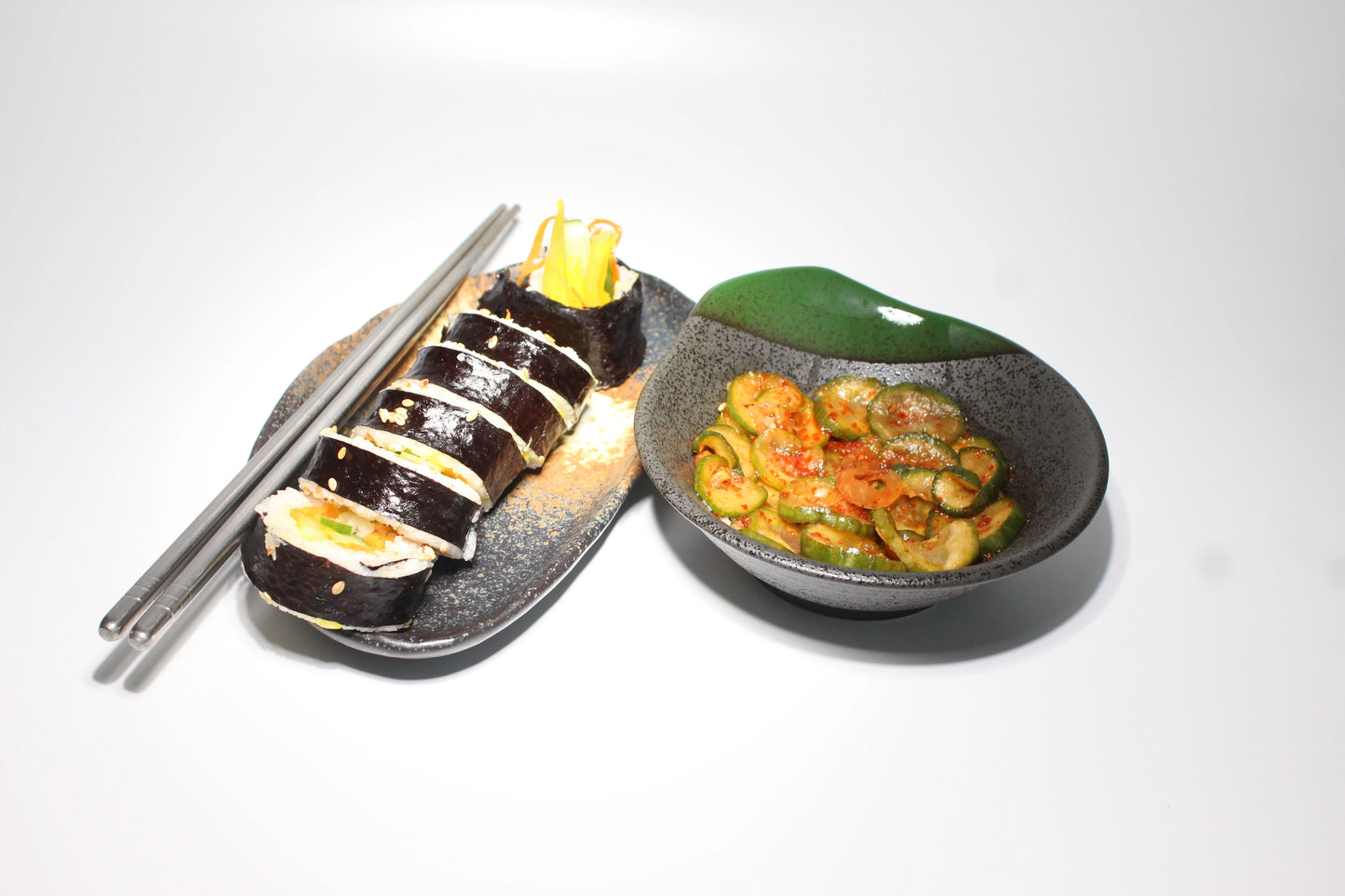 Grey & green Two toned textured ceramic serving bowl with Kimchi on it.