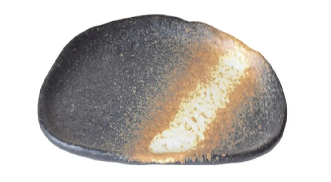 Black and gold stone on a white background