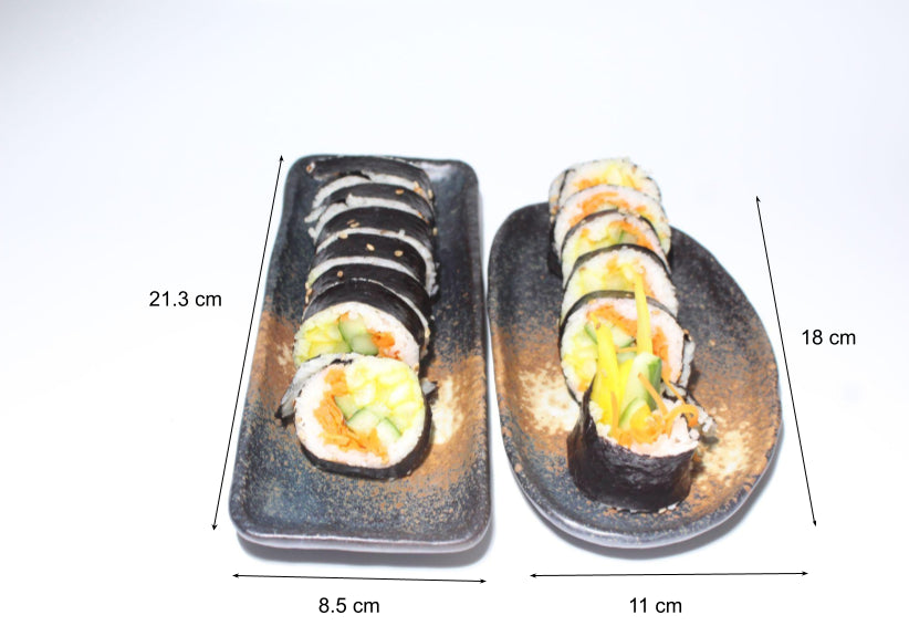 Snack plate set with Gimbap on it.