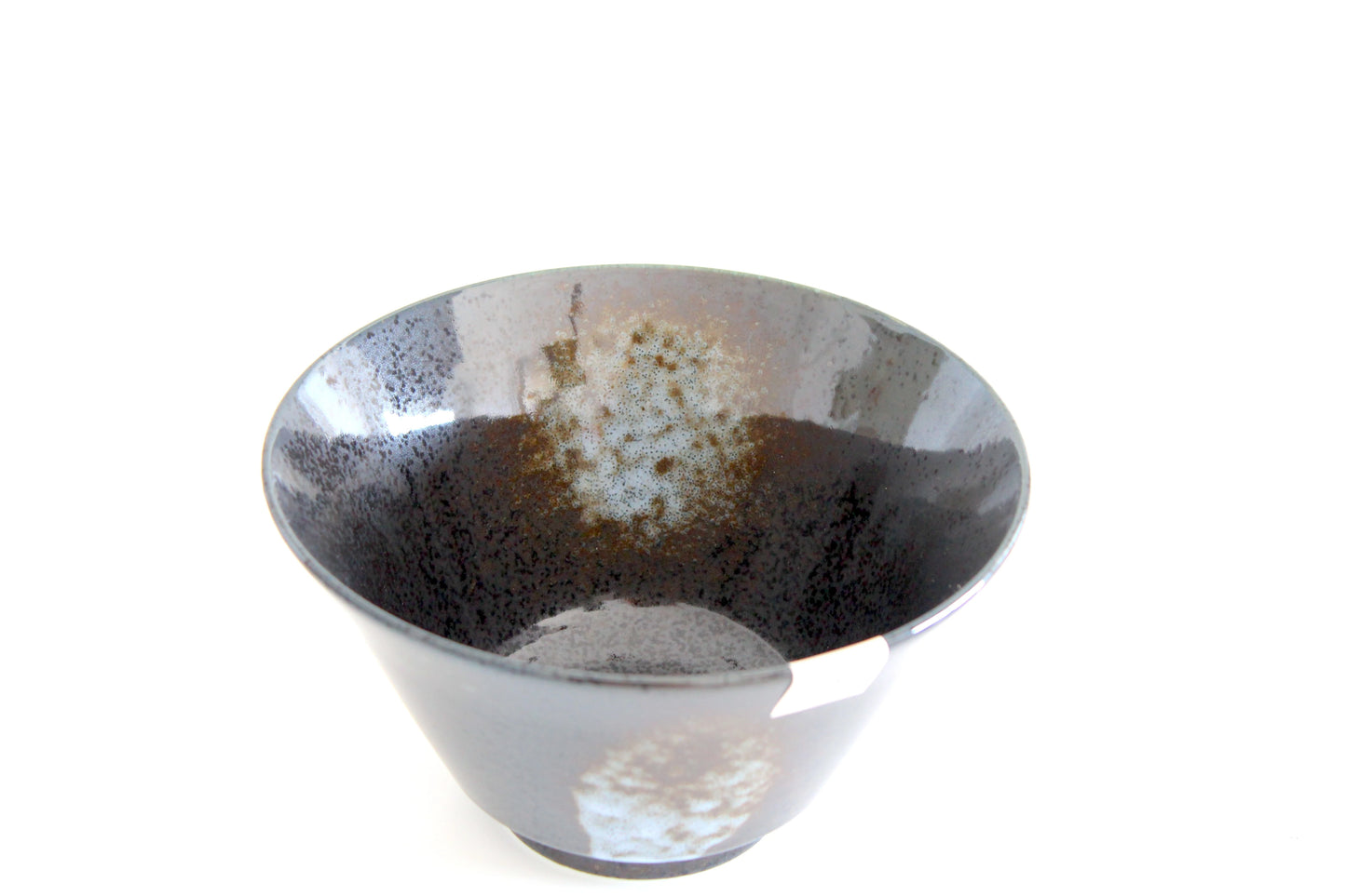 Conical ceramic ramen bowl featuring a black and brown glaze with subtle speckled patterns on the interior.