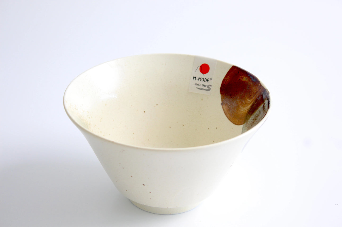 A conical, cream-colored ramen bowl with a subtle speckled finish and a warm brown accent near the rim, reminiscent of Mt. Fuji’s silhouette.
