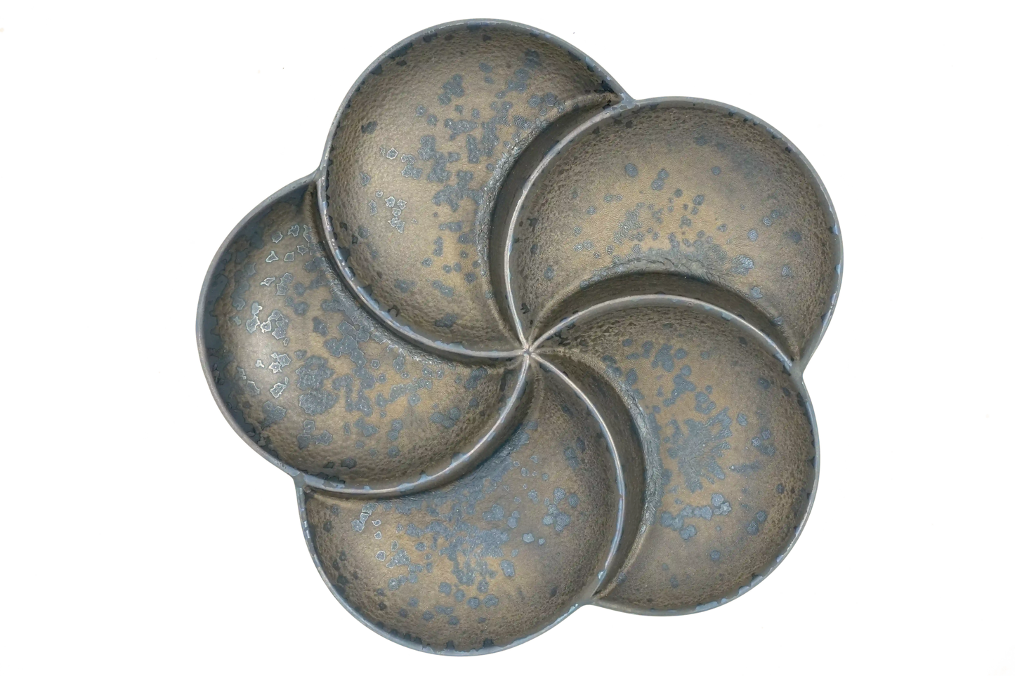 top view of a bronze, 5-section divided plate shaped like a flower petals.