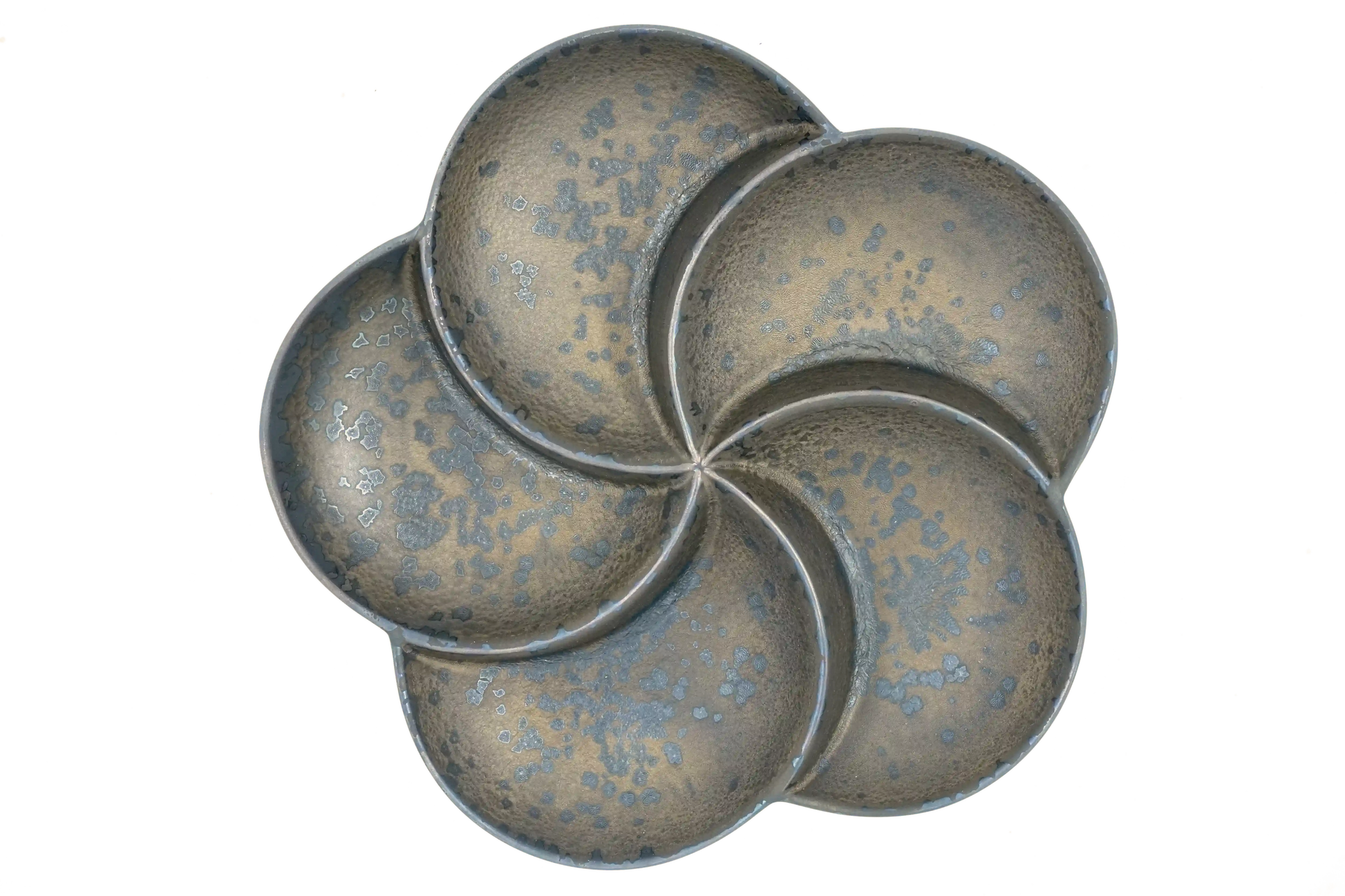 top view of a bronze, 5-section divided plate shaped like a flower petals.