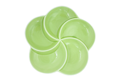 Top view of a 5-section green porcelain sectional thali for mindful eating and portion control of Indian meals.