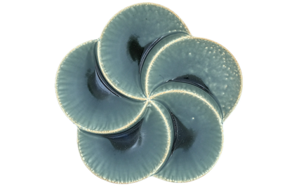 top view of an irabo, 5-section divided plate shaped like a flower petals.