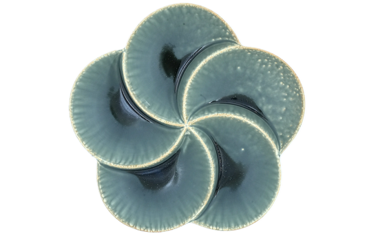 top view of an irabo, 5-section divided plate shaped like a flower petals.