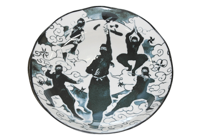 Japanese porcelain dining plate with ninjas in many fighting poses from top view