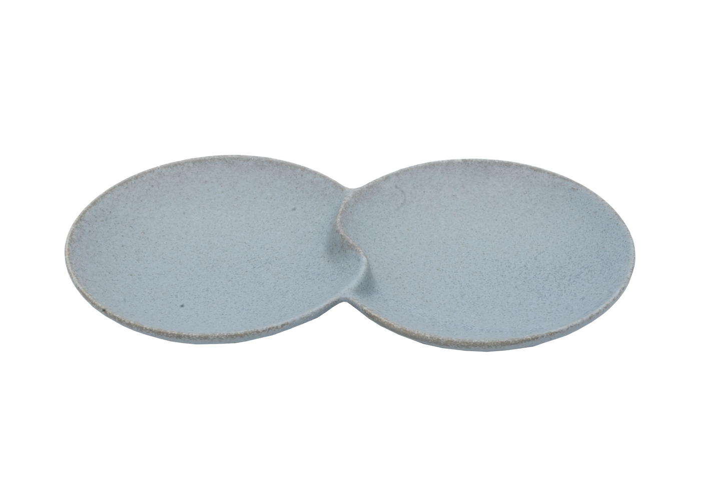 An isometric view of the Missera Hotate, a light gray ceramic divided serving dish with two circular sections joined in the center like a clam shell. Perfect as a multi compartment serving dish for snacks and dips.
