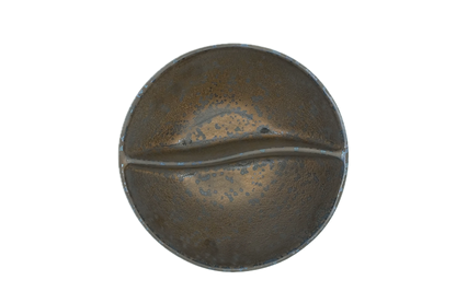 A top view of the Missera Kari, a deep bronze divided bowl