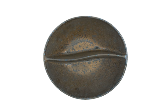 A top view of the Missera Kari, a deep bronze divided bowl