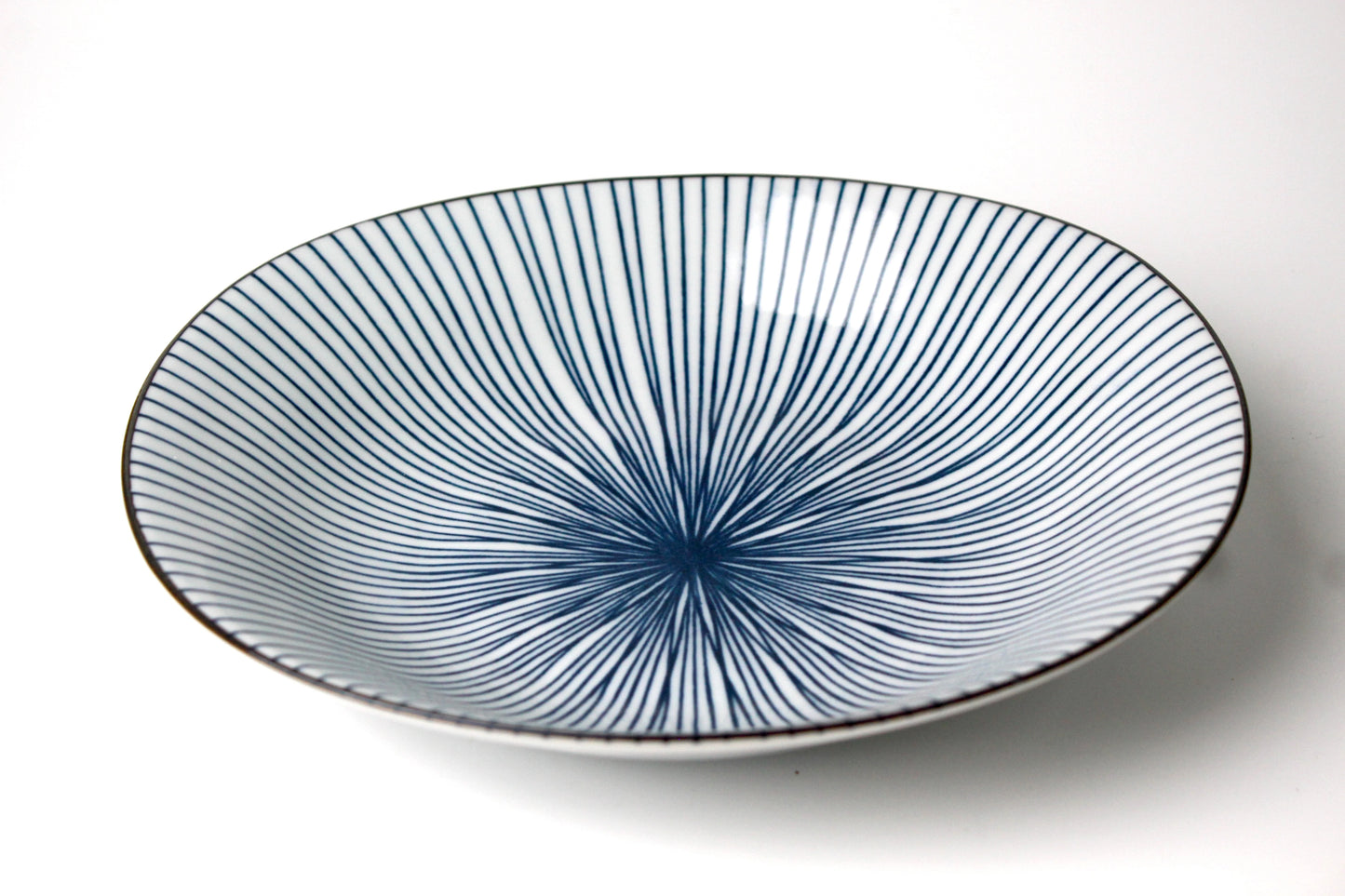 Oval ceramic plate with a blue Sensu (folding fan) design, featuring delicate radiating lines for a refined Japanese-inspired aesthetic.